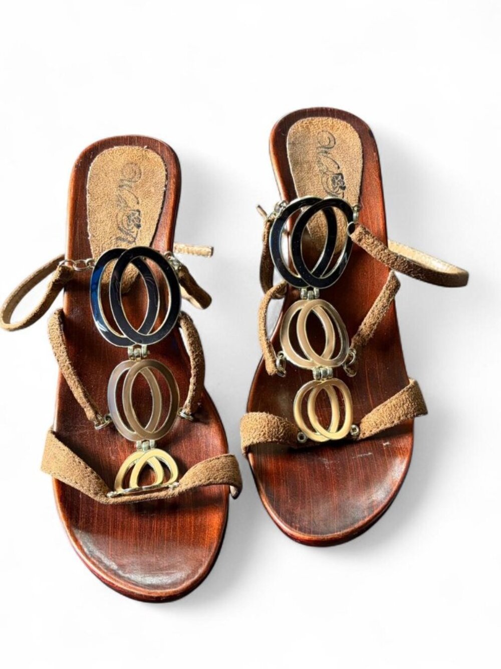 Y2K brown leather heels with gold and black circular metal embellishments Size